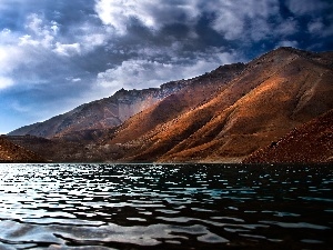 Mountains, clouds, sea