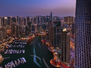 Dubaj, Boats, skyscrapers, night, clouds