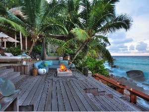 Stones, Palms, Sky, sea, Hotel hall, couch, clouds, fire