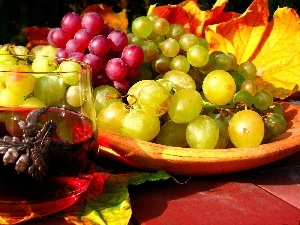 A glass, Grapes