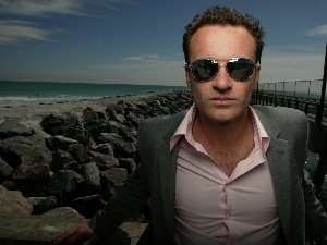 Glasses, shirt, Julian McMahon, stretched