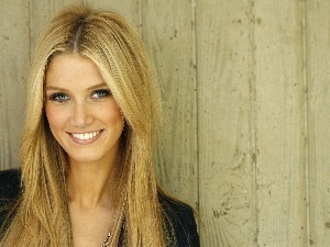 Delta, Goodrem, smiling