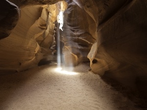 light breaking through sky, cave
