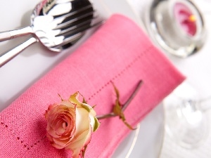 cutlery, napkin, rose