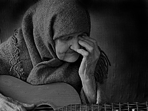 Guitar, old woman