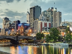 River, bridge, skyscrapers, clouds