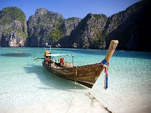 Boat, rocks, sea