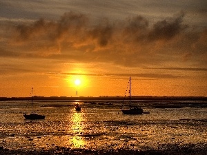 Sailboats, sun, lake, west