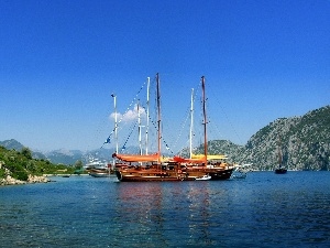 Mountains, sailboats, sea