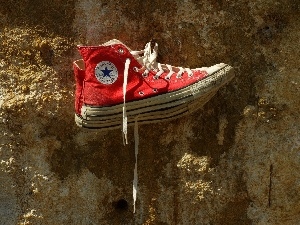 hanging, sneakers, rocks