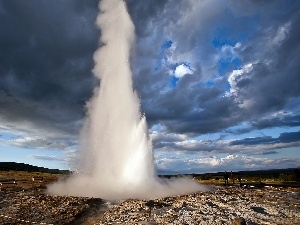 Tourists, geyser, dark, clouds