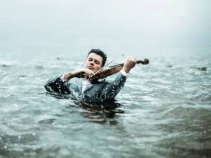 violin, water, a man