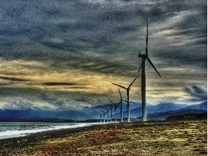 Windmills, sea, clouds, Mountains