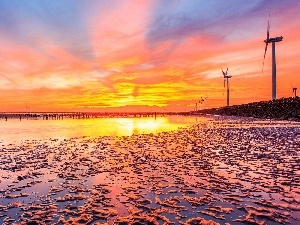 Windmills, water, west, sun