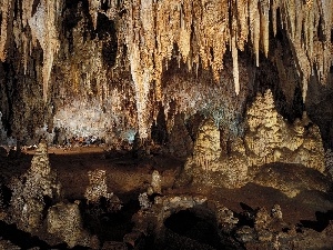 People, stalactites, cave, hanging