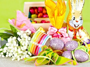 Ribbons, eggs, rabbit, lilies, chocolate